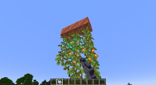 Two children laugh joyfully, one with light skin and a pink shirt, the other with darker skin and a blue shirt.