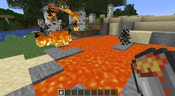 A tranquil river flows through a dense forest under a cloudy sky.