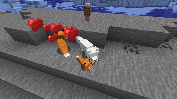 A person's hands holding a modern smartphone, typing a message.