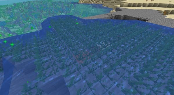 A close-up shot of a cat with vibrant green eyes.