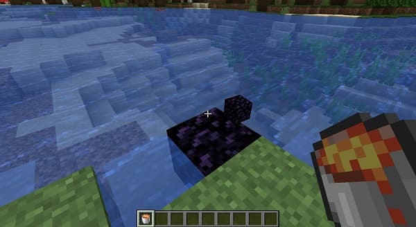 A sleek black electric vehicle charging at a station.