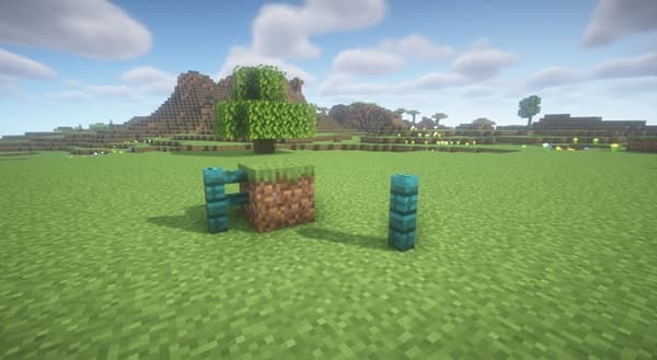 Woman working on laptop at modern office desk.