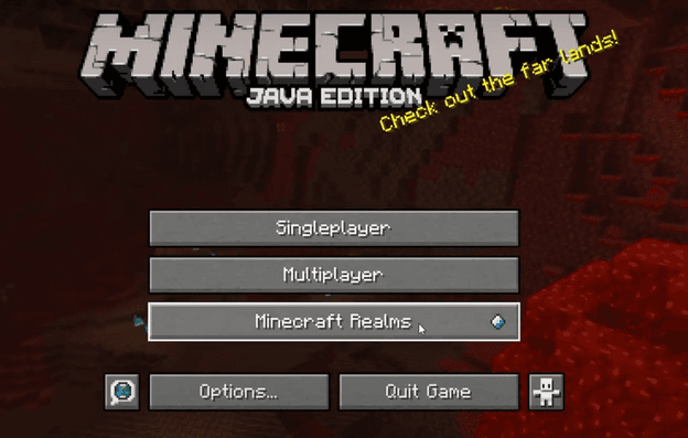 A person's hand pressing a button on a control panel.