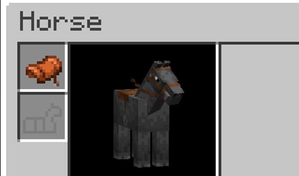 A close-up of dark grey rocks with various textures, perfect for a garden landscape.