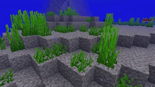 Black and white image of a smiling African American woman holding a coffee cup.