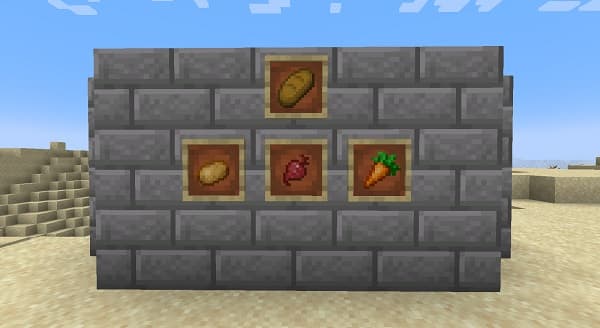 A person working on a laptop at a desk.