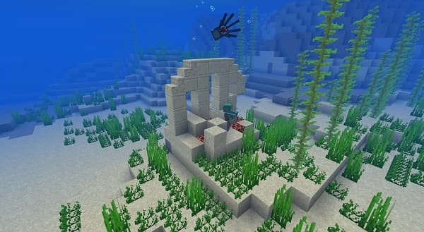 A serene image of a bright, clear blue sky with a few wispy white clouds.