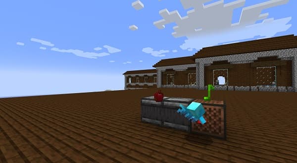 Brown dog with a red collar running on a green grass lawn.