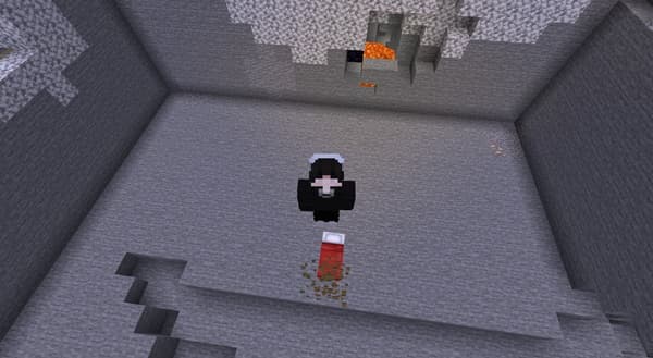 Man using laptop and smartphone outdoors in a park.