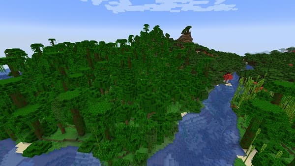 Blurred background of a city street at night, with bokeh lights.