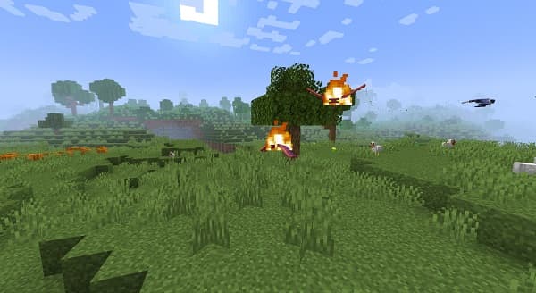 Black smartphone on a white desk with empty screen.