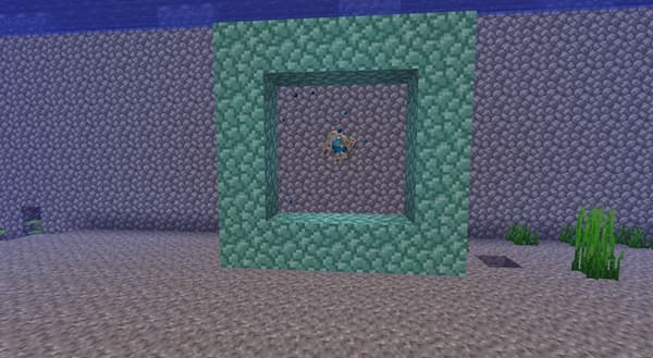 Dark, starry night sky over a mountain silhouette.