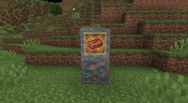 Two women chatting in an office environment.