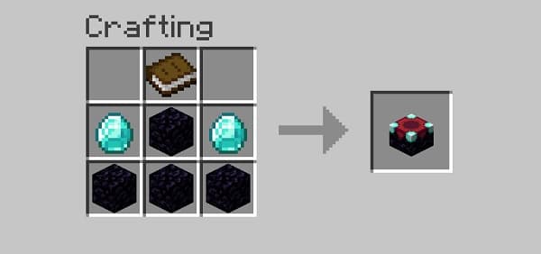 Blue waves crashing on a sandy beach at sunset.