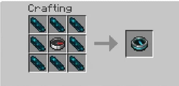 Black and white photo of a dark, narrow, winding street at night in a historic European city.