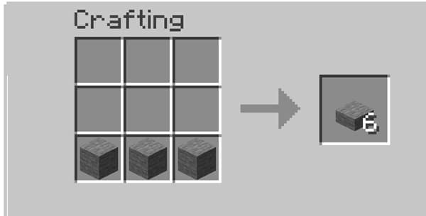 A black and white photo of a modern outdoor metal sculpture.