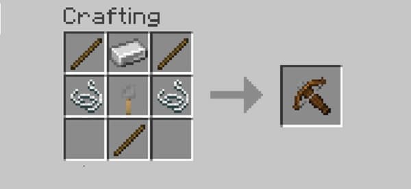 Red fox walking through a snowy forest.