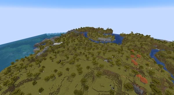 A person standing alone on a vast, open landscape under a dramatic sky.