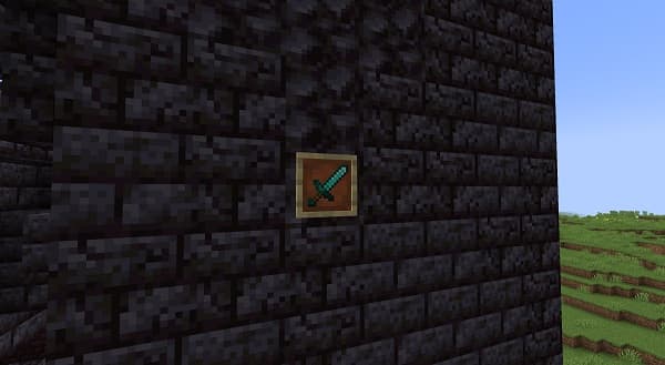 Man writing notes in a spiral notebook with a pen.