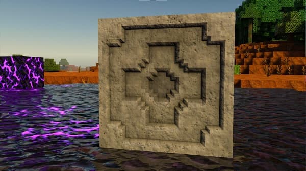 A green plant with broad leaves and a few red berries.