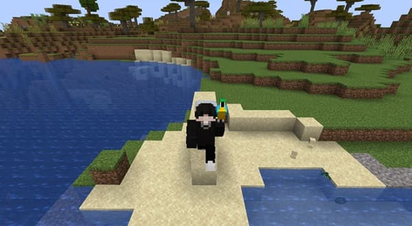 A close-up of a vibrant, healthy green plant with dew drops on its leaves, symbolizing growth and nature.