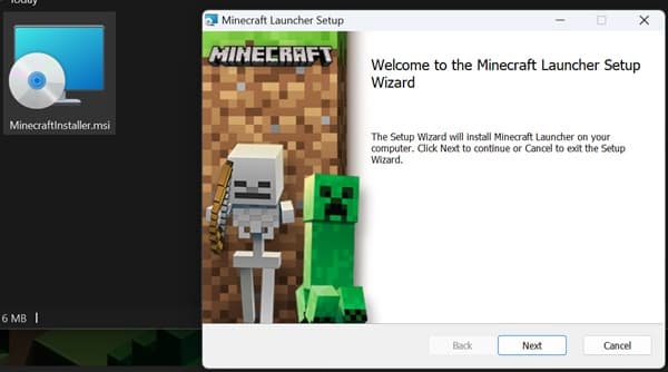 A close-up of a vibrant green succulent plant with pointed leaves, thriving in sunlight.