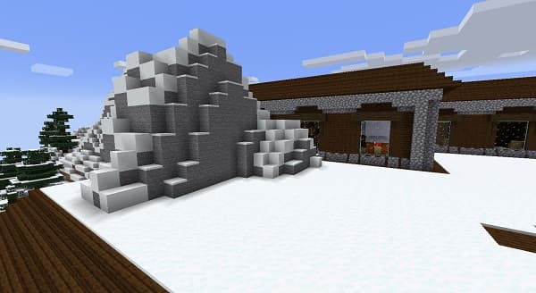 A close-up shot of a textured gray wall with subtle shadows, showcasing its rough surface.