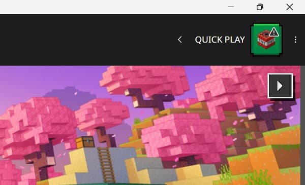 A red brick house with a white front door and green bushes.