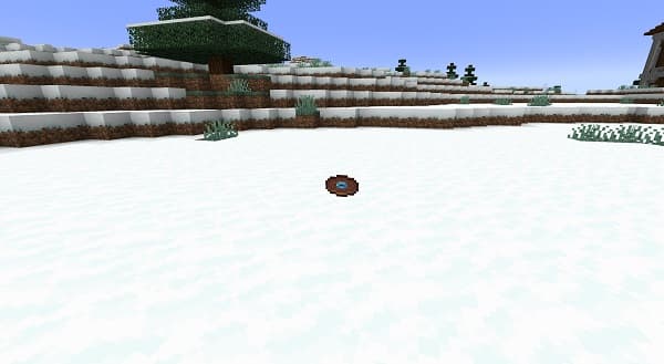 Young woman smiling and walking through a bustling city street at sunset.