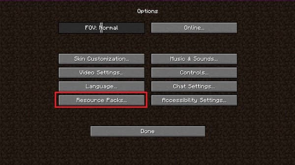 Empty green field under a clear blue sky.