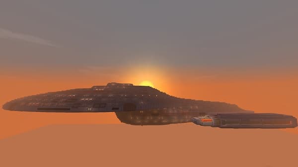 Empty office chair facing a modern standing desk.