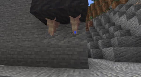 A pile of neatly stacked, folded beige linen towels.