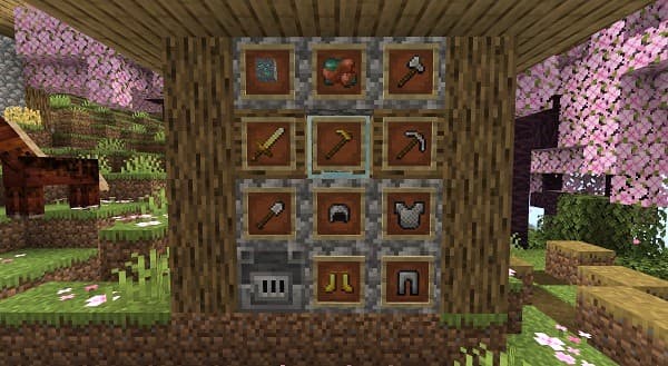 A large, modern building with many windows, reflecting the sky.