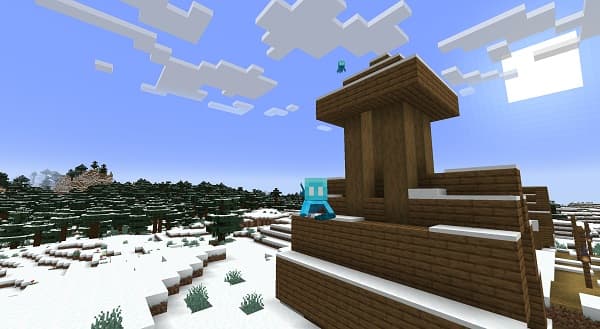 A lone tree stands majestically in a golden field under a vibrant sunset.