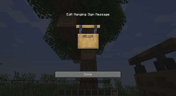 Smiling woman holding a smartphone.