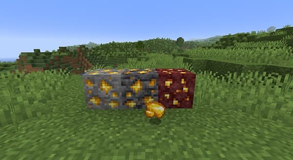 Man playing a brass trumpet with sheet music on a stand.