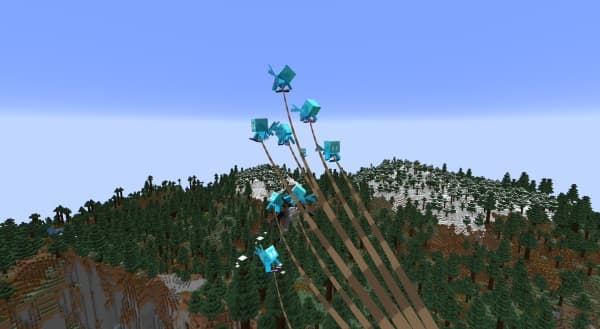 A fluffy white cloud floating in a clear blue sky.